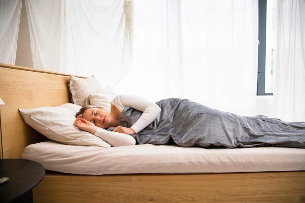 middle-aged woman sleeping comfortably during menopause
